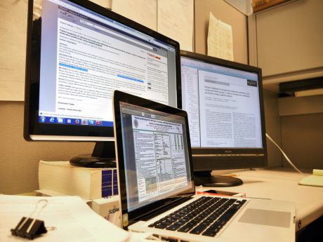 computer screens displaying data