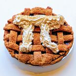 Henry's Apple Pie with the Pi symbol drawn out with oat whipping cream