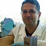 Roy holds a silicon filter used in his artificial kidney prototype.