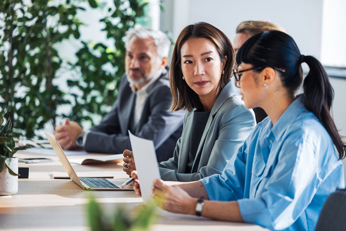 woman listening intently in a meeting