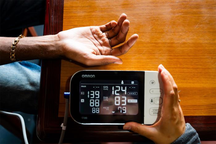 blood pressure reading next to a patient's arm