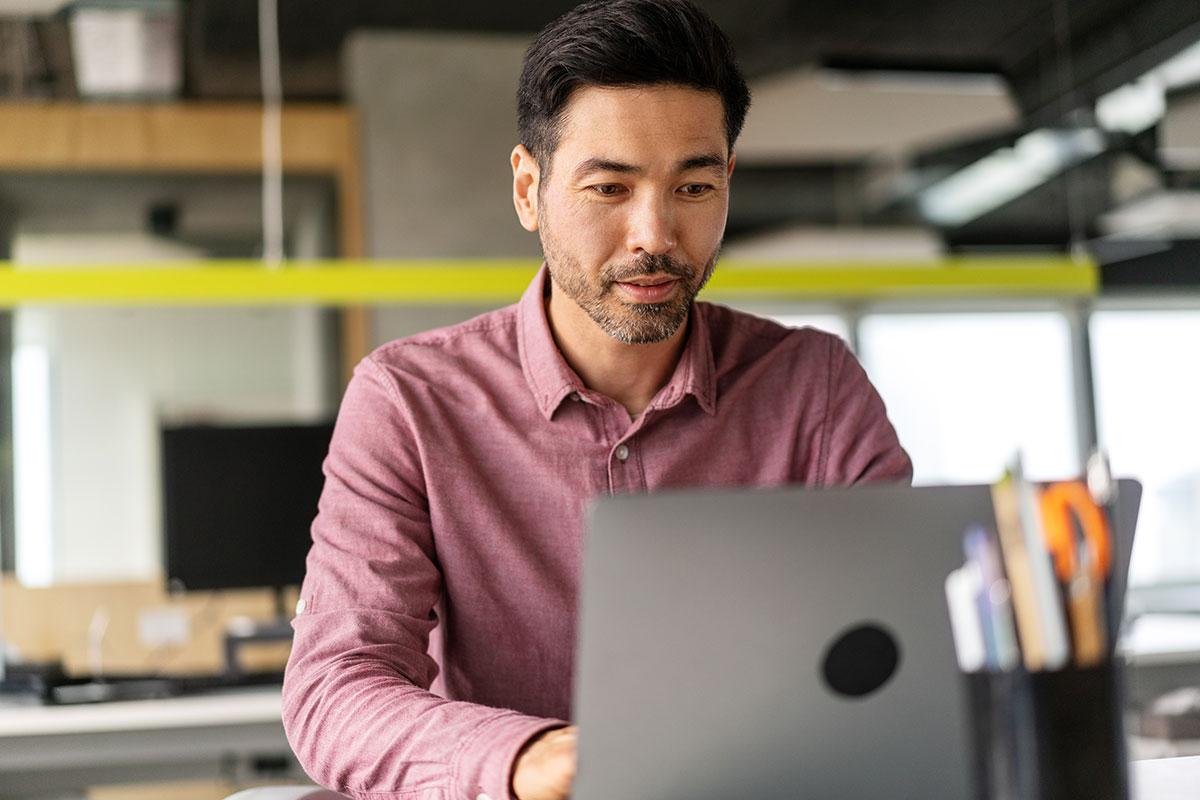 man using laptop